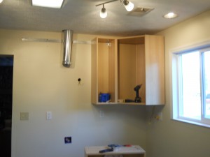 Range hood cabinet removed - it was too tall!